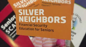 A group of seniors participate in a "learning circle," part of the Silver Neighbors program