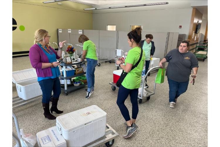 Volunteers and MIFA staff work together to get the food delivered to homes  Monday through Wednesday and to 14 area congregate sites Monday through Friday. 